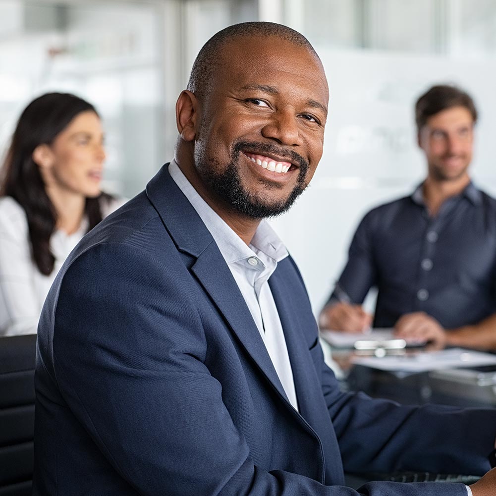 mature african businessman at meeting 3t77lv7.jpg